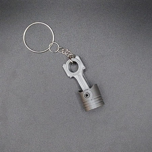 Porta-chaves Pistão